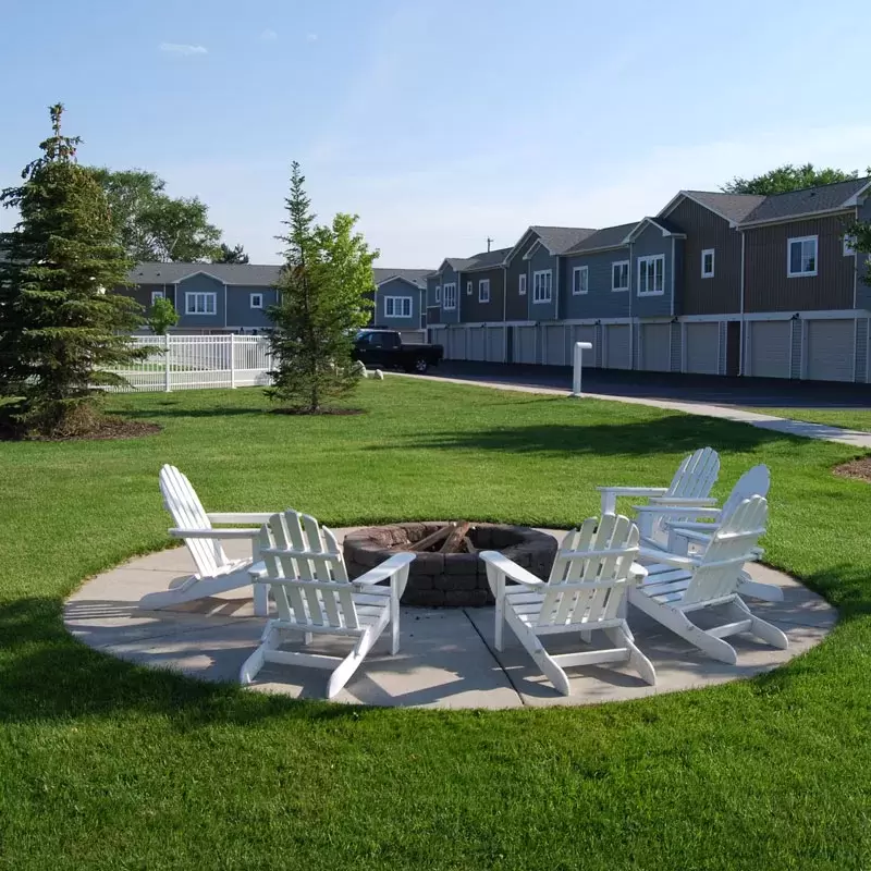 Chairs surround the firepit at the Liv Arbors apartment complex in Traverse City, Mi.