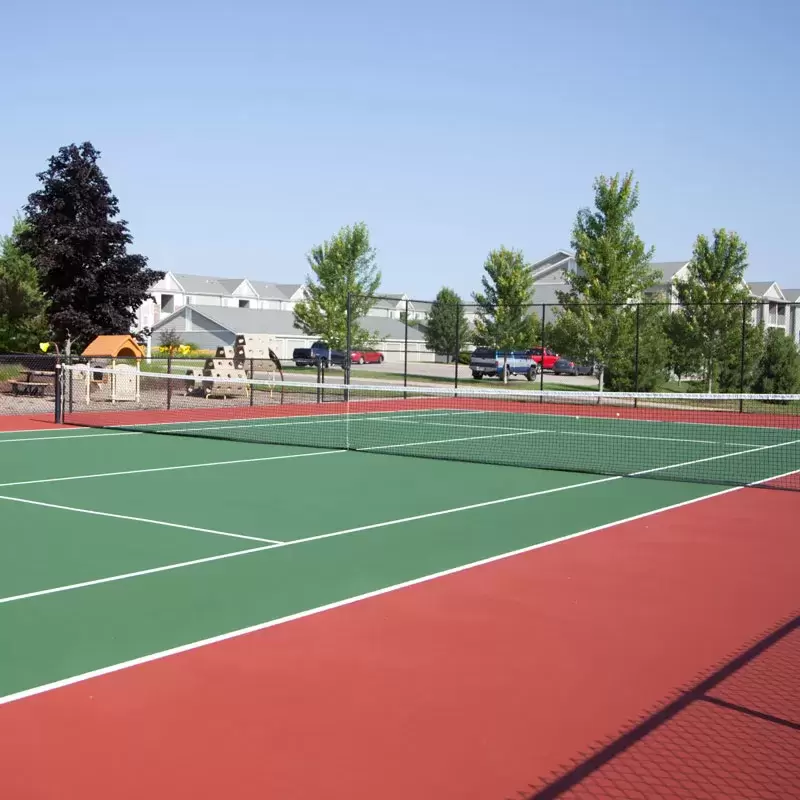 A view of the tennis courts at Liv Arbors apartments.
