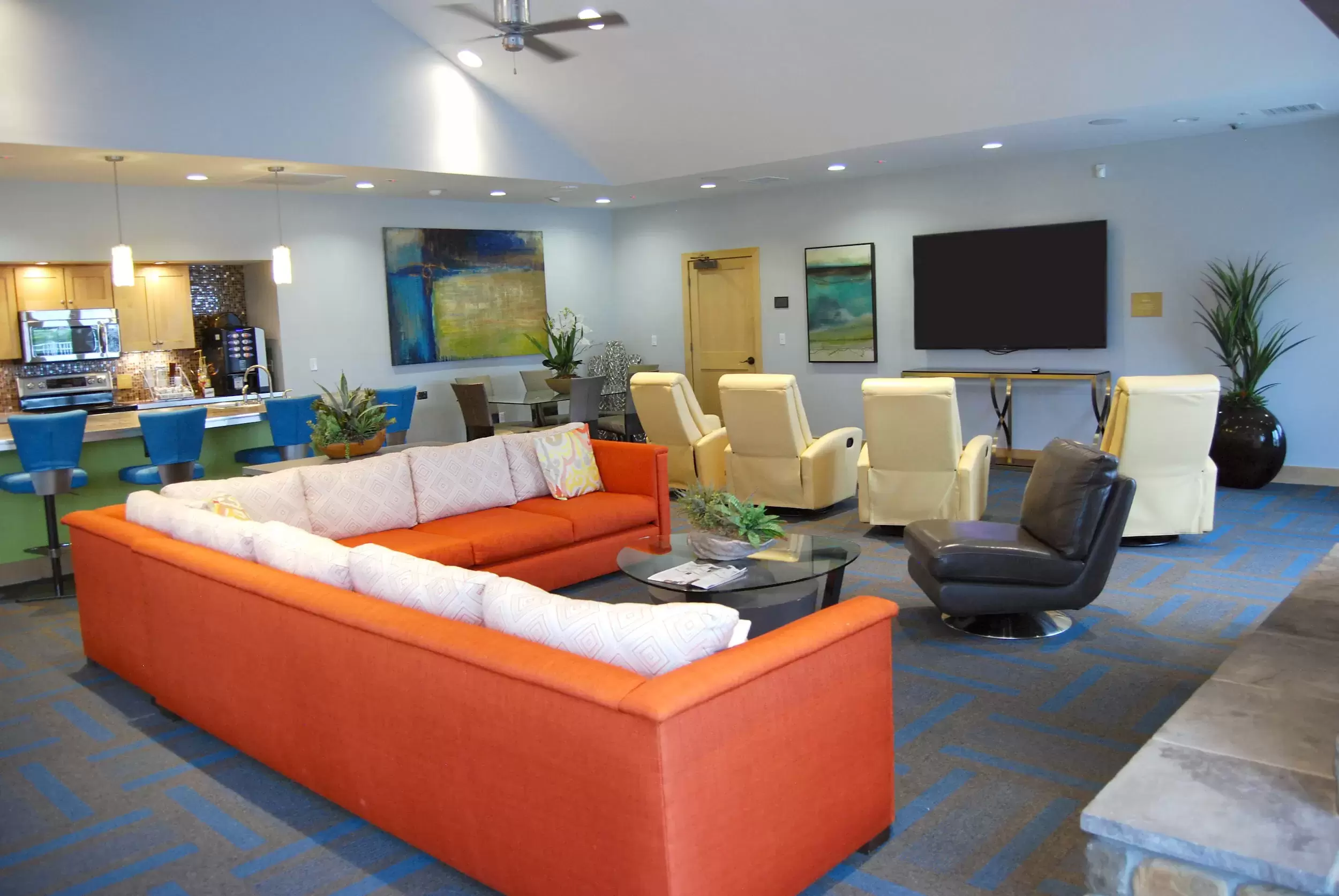 The Resident Hub, with comfortable seating and a large tv, is a great place to hang out.